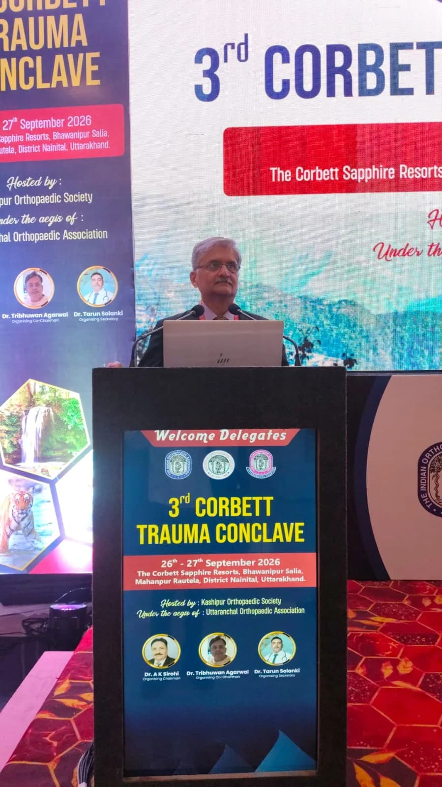 Presenting at the podium, Corbett Trauma Conclave 2026